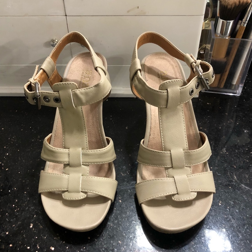 High Heeled sandals.